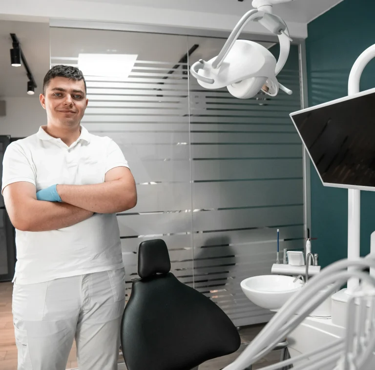 Dentist preparing for patient examination
