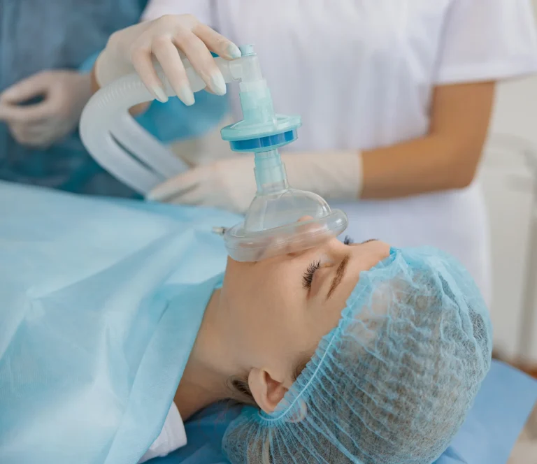 Dentist administering sedation treatment