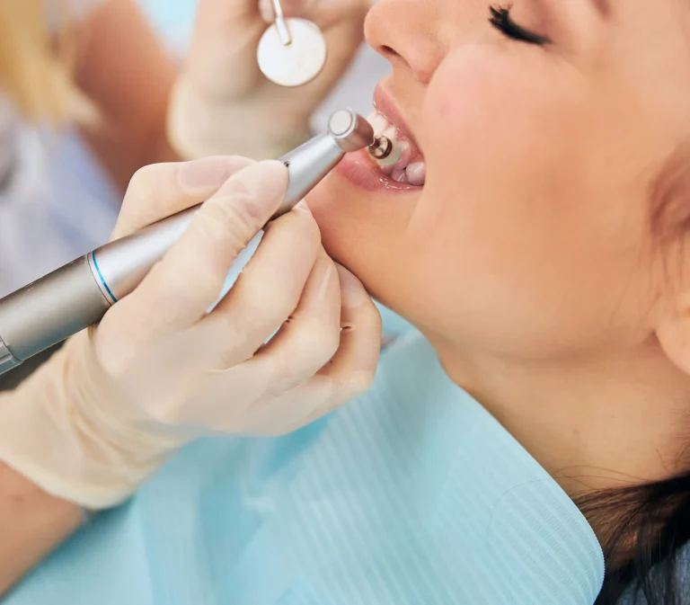 Dentist checking oral health