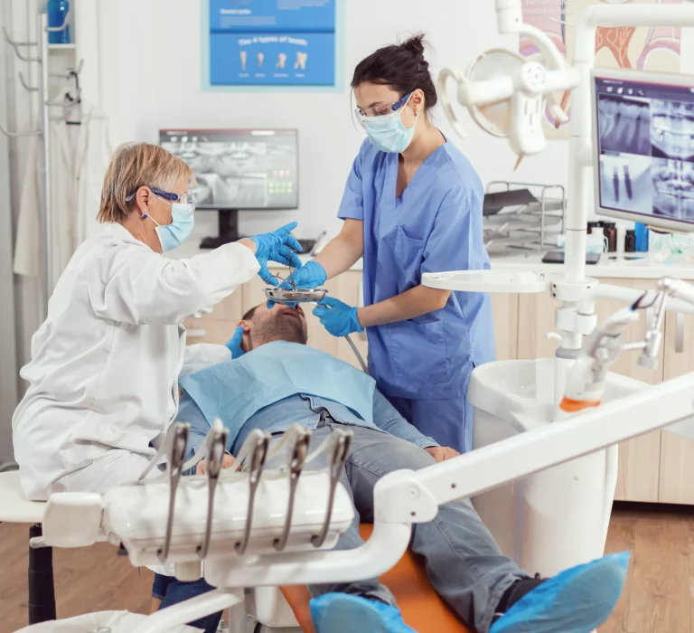 Dental specialists during surgery