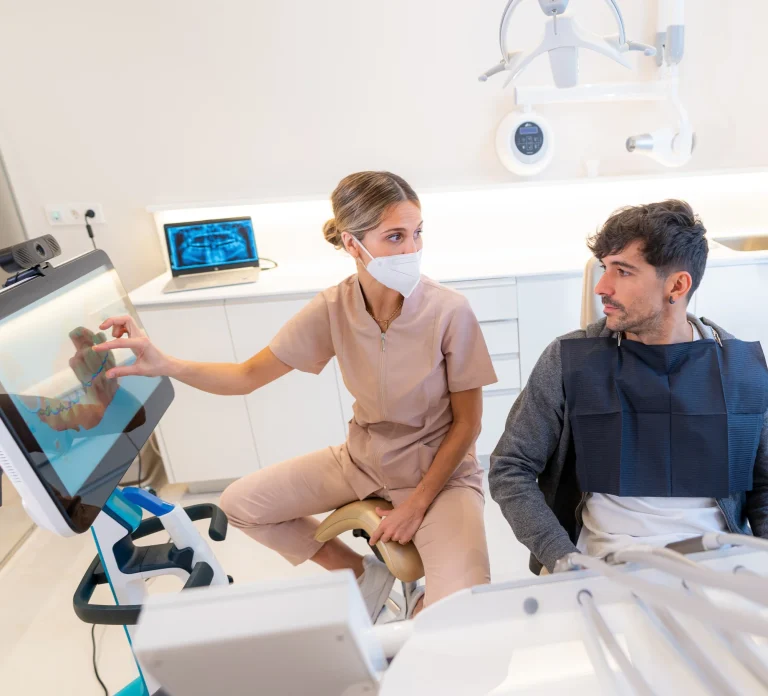 Dentist explaining X-ray results