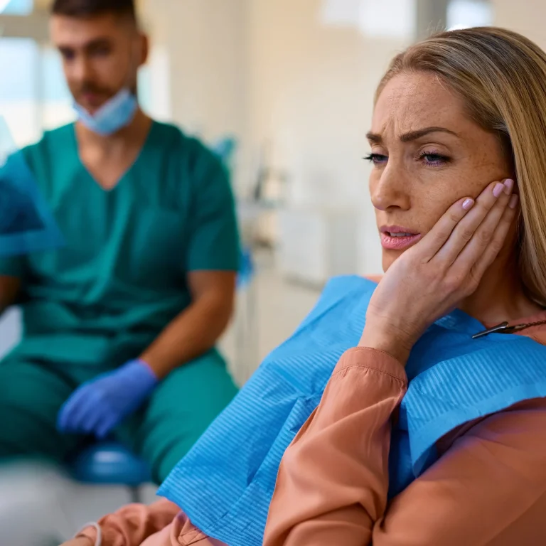 Dentist discussing tooth pain