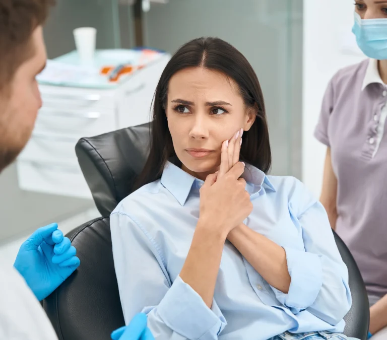 Dentist assessing dental pain